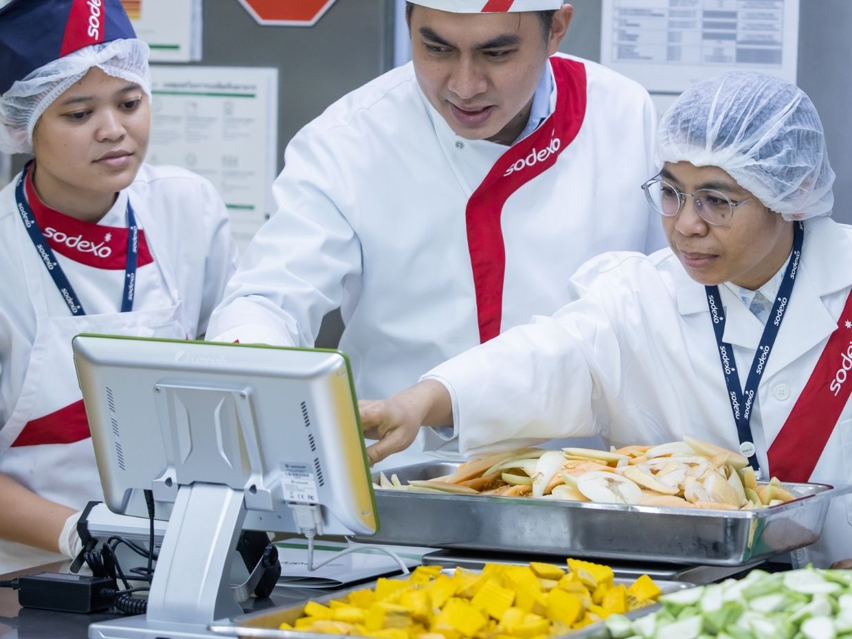 Sodexo chefs using a WasteWatch device